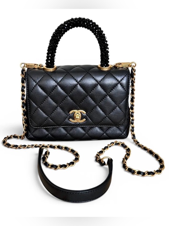 CHANEL Handbags - CHANEL Mini Flap Black Quilted Lambskin with Beaded-Handle Shoulder Bag.